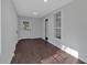 Sun Room with tile flooring, white paneling and trim, and natural light at 116 Tallapoosa St, Temple, GA 30179