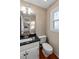 Bright bathroom with modern vanity, granite countertop, and classic fixtures at 1190 Midland Way, Lawrenceville, GA 30043