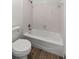 Clean white bathroom featuring a shower and toilet at 1190 Midland Way, Lawrenceville, GA 30043