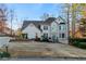 Charming two-story home with a well-manicured lawn and a beautiful blue front door at 1190 Midland Way, Lawrenceville, GA 30043