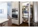 Kitchen with stainless appliances, pantry, double oven, and lots of storage at 341 Little Pine Ln, Woodstock, GA 30188