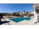 Covered community pool, with neighborhood homes and trees in the background on a clear day at 341 Little Pine Ln, Woodstock, GA 30188