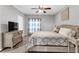 Bedroom featuring neutral carpet, television, ceiling fan, and a comfy bed at 4481 Mclain Cir, Acworth, GA 30101
