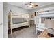 Cozy bedroom featuring two charming bunk beds, perfect for or guests, and a neutral color scheme at 4481 Mclain Cir, Acworth, GA 30101