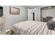 Cozy bedroom with a comfortable bed, stylish decor, and ample space for relaxation, next to the closet at 4481 Mclain Cir, Acworth, GA 30101