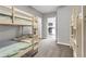 Bright bedroom with bunk beds, offering a comfortable and playful space, and a glimpse into the kitchen at 4481 Mclain Cir, Acworth, GA 30101