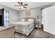 Bedroom with ceiling fan, decorative bedding, and ample natural light at 4481 Mclain Cir, Acworth, GA 30101