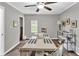 Dining room featuring a farmhouse table with bench seating and modern decor at 4481 Mclain Cir, Acworth, GA 30101