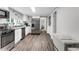 Spacious kitchen featuring stainless steel appliances, ample counter space, and a stylish design at 4481 Mclain Cir, Acworth, GA 30101