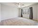 Empty bedroom with neutral colors, a large window, and ample space at 1108 Gwens Sw Trl, Lilburn, GA 30047