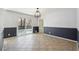 Formal dining area with modern lighting, deck access at 1108 Gwens Sw Trl, Lilburn, GA 30047
