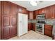 Well-equipped kitchen featuring ample cabinets and stainless steel appliances at 1108 Gwens Sw Trl, Lilburn, GA 30047
