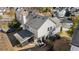 Aerial view of a backyard with a screened porch and mature trees at 3102 Ballet Se Ct, Smyrna, GA 30082