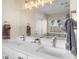 Contemporary bathroom features double sinks, a large mirror, and modern lighting at 3102 Ballet Se Ct, Smyrna, GA 30082