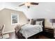 Cozy bedroom with hardwood floors, ceiling fan, and natural light from the window at 3102 Ballet Se Ct, Smyrna, GA 30082