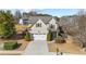 Well-maintained two-story home with a manicured lawn and an attached two-car garage at 3102 Ballet Se Ct, Smyrna, GA 30082