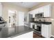 Updated kitchen with stainless steel appliances and white cabinets at 3102 Ballet Se Ct, Smyrna, GA 30082