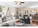 Open-concept living room with hardwood floors and stylish furnishings at 3102 Ballet Se Ct, Smyrna, GA 30082