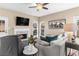 Comfortable living room area with a fireplace and access to the outdoor porch at 3102 Ballet Se Ct, Smyrna, GA 30082