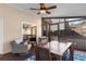 A screened-in porch has comfortable outdoor furniture and a ceiling fan at 3102 Ballet Se Ct, Smyrna, GA 30082