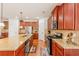 Well-equipped kitchen with granite counters, stainless appliances, and ample cabinet space at 4397 Challedon Dr, South Fulton, GA 30213