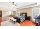 Expansive main bedroom suite with hardwood floors and sitting area at 4397 Challedon Dr, South Fulton, GA 30213