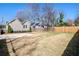 Large backyard with a well-maintained lawn and a privacy fence at 938 Allene Sw Ave, Atlanta, GA 30310