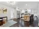 Open concept kitchen with an island, stainless steel appliances, and views into an adjacent dining area at 2336 Mark Trl, Decatur, GA 30032