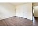 Bedroom featuring vinyl floors, neutral walls and a double door closet at 3060 Scepter Dr, Duluth, GA 30096