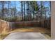 The back yard has a fence and a concrete patio space at 3266 Spicy Cedar Ln, Lithonia, GA 30038