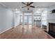 Bright and airy living room with hardwood floors, fireplace, and coffered ceiling at 3266 Spicy Cedar Ln, Lithonia, GA 30038