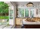 The Kitchen with an island and views of the backyard at 455 Peachtree Battle Nw Ave, Atlanta, GA 30305