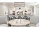 Bright and airy kitchen with large island, modern stools, and open shelving at 455 Peachtree Battle Nw Ave, Atlanta, GA 30305