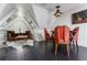 Attic living room space featuring exposed wood beams, seating, and dark wood floors at 455 Peachtree Battle Nw Ave, Atlanta, GA 30305