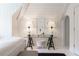 Bright workspace featuring a glass desk, natural lighting, and white paneled walls at 455 Peachtree Battle Nw Ave, Atlanta, GA 30305