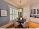 Cozy breakfast nook with built-in cabinets, a charming chandelier, and natural light, perfect for casual dining at 5043 Willeo Estates Dr, Marietta, GA 30068