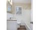 Well-lit bathroom with a granite-topped vanity, white tile, and modern fixtures creates a fresh, clean feel at 3173 Canary Ct, Decatur, GA 30032