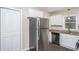 Kitchen features stainless-steel appliances, granite countertops, and ample storage at 3173 Canary Ct, Decatur, GA 30032