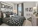 Comfortable bedroom with a black and white color scheme and decor for dog lovers at 403 Nix Ln, Lawrenceville, GA 30046