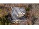 Aerial view showcases the architectural details and gray roof of this luxury residence at 1458 Sweet Bottom Cir, Marietta, GA 30064