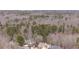 A view of the community with houses nestled among mature trees at 1458 Sweet Bottom Cir, Marietta, GA 30064
