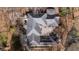 Aerial shot shows the home's intricate roofline, chimney and deck at 1458 Sweet Bottom Cir, Marietta, GA 30064