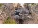 Stunning aerial view of a grand estate nestled among mature trees offering privacy and seclusion at 1458 Sweet Bottom Cir, Marietta, GA 30064
