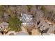 Overhead view of a large house with a sprawling driveway and lush trees at 1458 Sweet Bottom Cir, Marietta, GA 30064