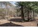 Backyard view with wooded lot and foot bridge at 1458 Sweet Bottom Cir, Marietta, GA 30064