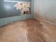 Unfinished basement with concrete floors and walls, showing signs of moisture damage at 1458 Sweet Bottom Cir, Marietta, GA 30064