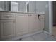Bathroom cabinets with crystal knobs and gray walls at 1458 Sweet Bottom Cir, Marietta, GA 30064