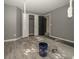 View of bedroom featuring a closet, updated flooring, and opportunity for renovation at 1458 Sweet Bottom Cir, Marietta, GA 30064