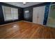 Bedroom with hardwood floors and natural light from the window at 1458 Sweet Bottom Cir, Marietta, GA 30064