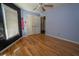 Bedroom with hardwood floors and natural light from the window at 1458 Sweet Bottom Cir, Marietta, GA 30064